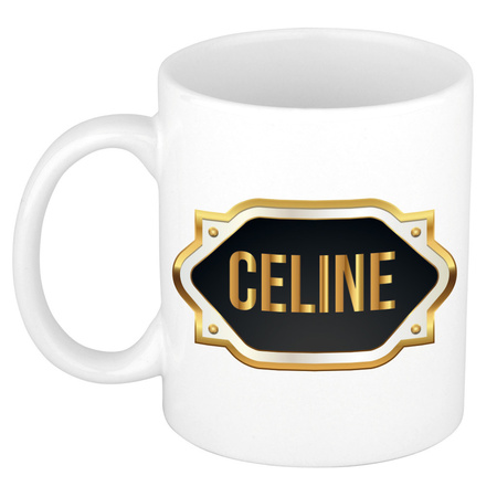Naam cadeau mok / beker Celine met gouden embleem 300 ml