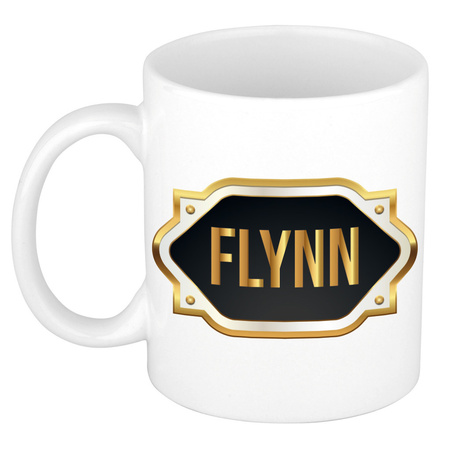 Naam cadeau mok / beker Flynn met gouden embleem 300 ml