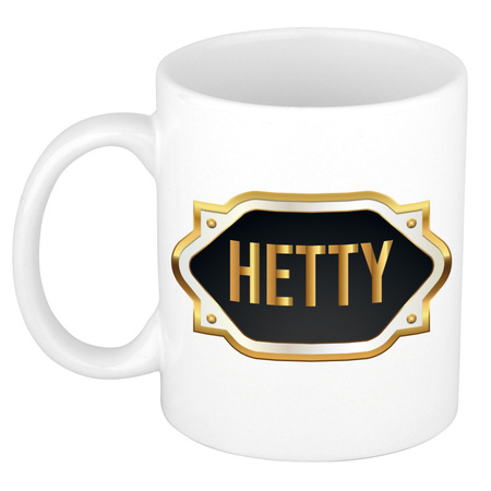 Name mug Hetty with golden emblem 300 ml