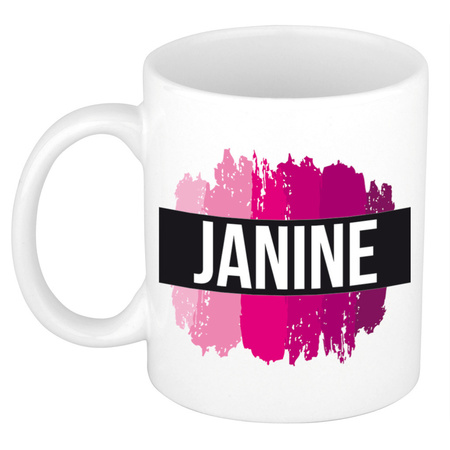 Naam cadeau mok / beker Janine  met roze verfstrepen 300 ml