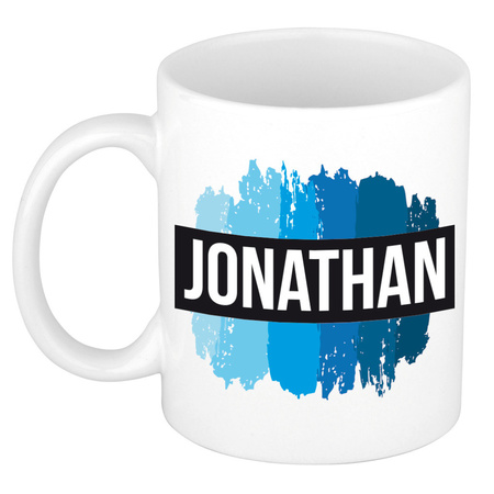 Naam cadeau mok / beker Jonathan met blauwe verfstrepen 300 ml
