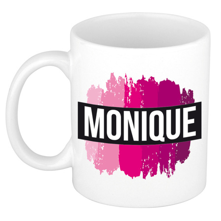 Naam cadeau mok / beker Monique  met roze verfstrepen 300 ml