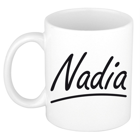 Naam cadeau mok / beker Nadia met sierlijke letters 300 ml