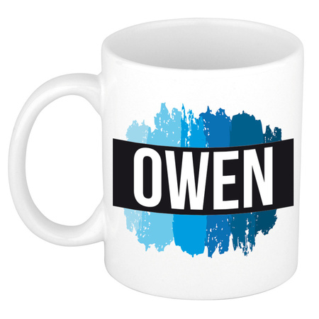 Name mug Owen with blue paint marks  300 ml
