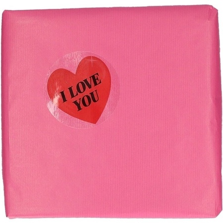 Valentine wrappingpaper with heart sticker